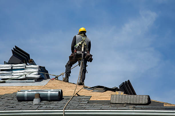 Professional Storm Damage Roof Repair technician working in Wellington, FL